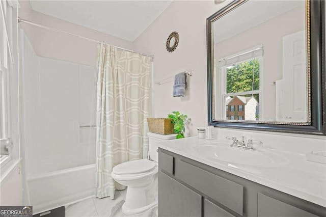 full bathroom with tile patterned floors, vanity, shower / bath combo, and toilet