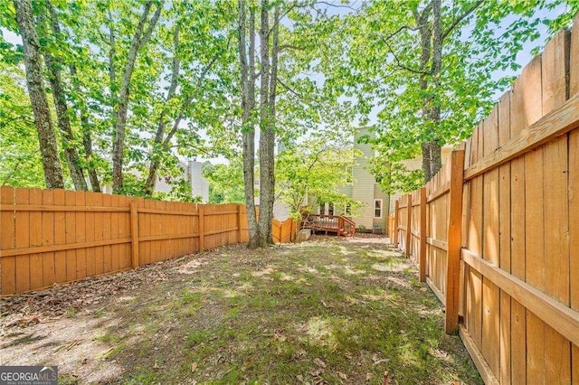 view of yard with a deck