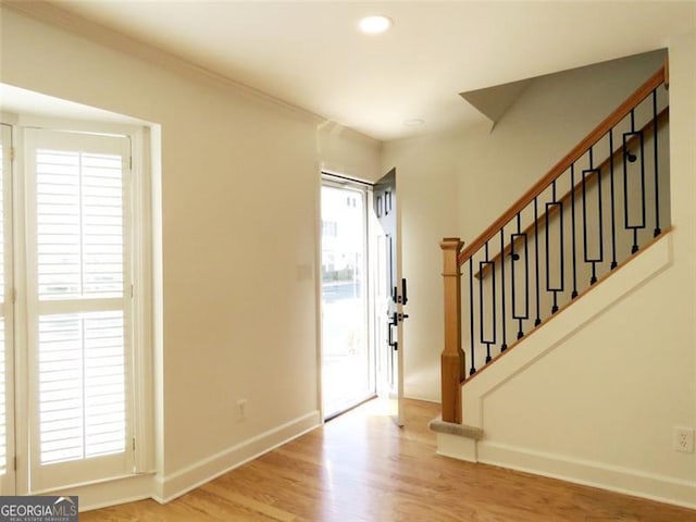 entryway with light hardwood / wood-style floors