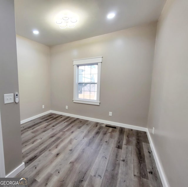 1311 Juniper St, Lagrange, GA 30240 - unfurnished room with recessed lighting, baseboards, visible vents, and wood finished floors