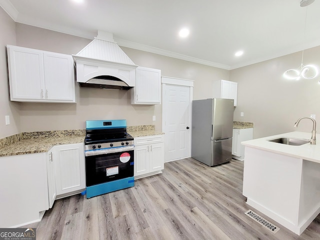 1311 Juniper St, Lagrange, GA 30240 - kitchen featuring a sink, ornamental molding, visible vents, custom range hood, and appliances with stainless steel finishes