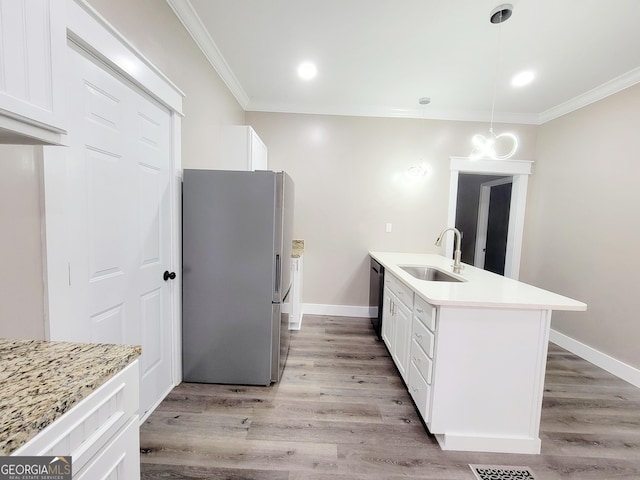 1311 Juniper St, Lagrange, GA 30240 - kitchen with light countertops, ornamental molding, a sink, stainless steel appliances, and white cabinets