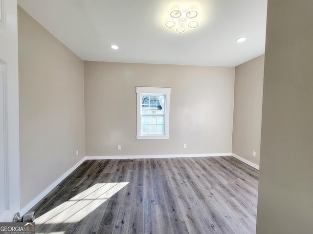 unfurnished room featuring light hardwood / wood-style flooring