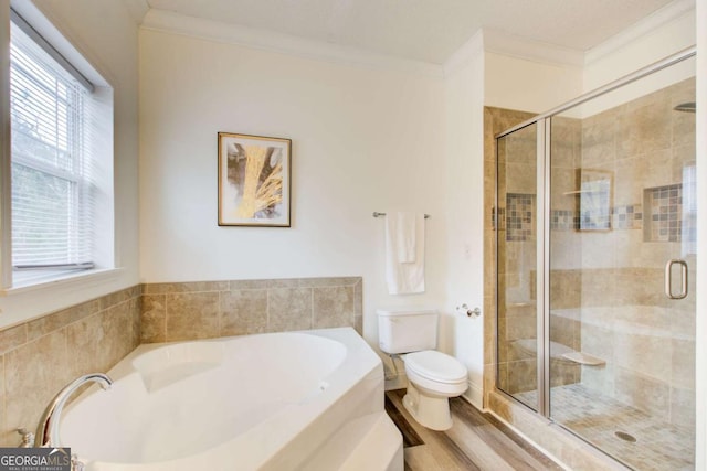 bathroom featuring a healthy amount of sunlight, toilet, crown molding, and plus walk in shower