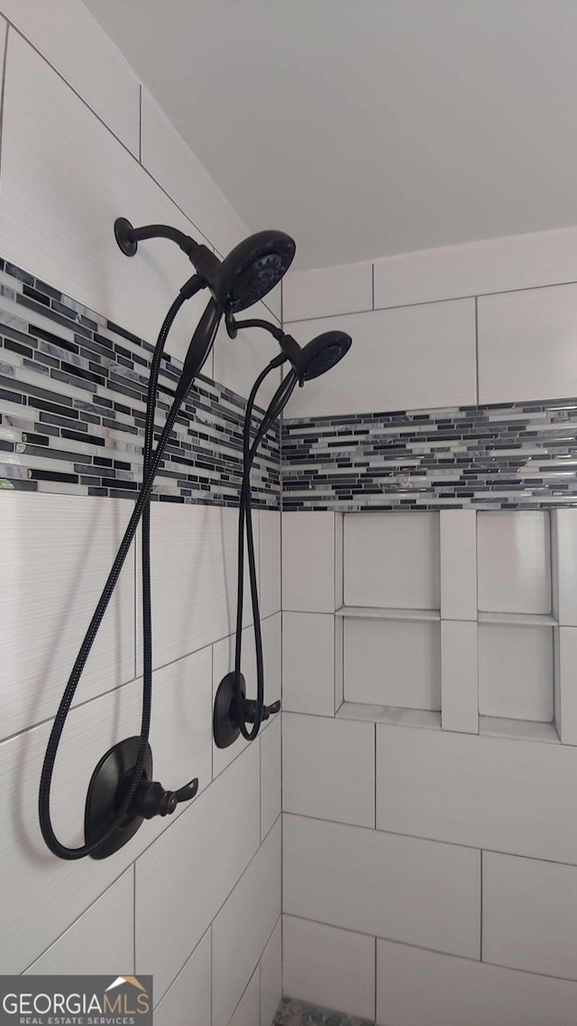 details with a tile shower