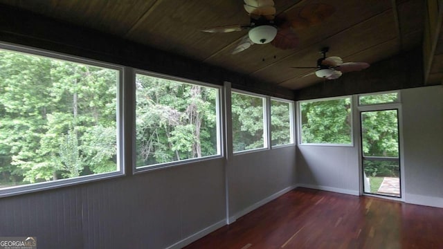 unfurnished sunroom with lofted ceiling and wooden ceiling