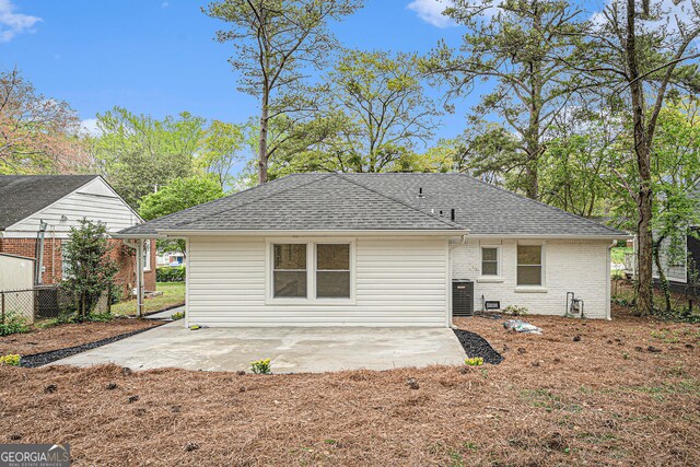 rear view of property featuring a patio area