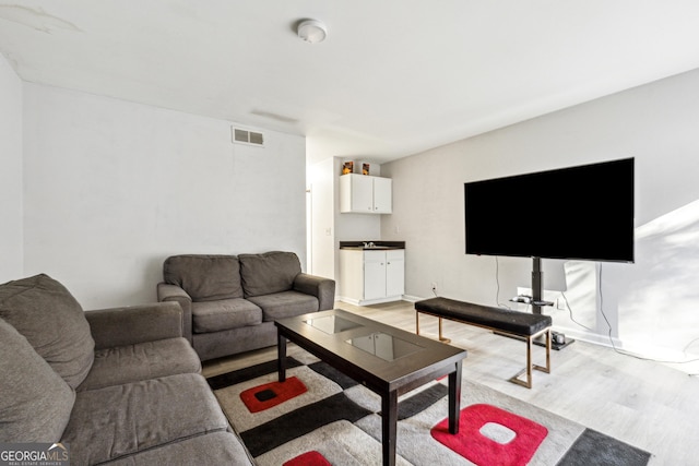 living room featuring light hardwood / wood-style flooring