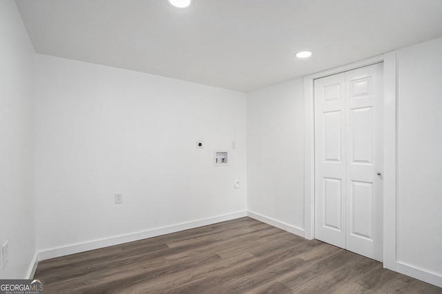 laundry room with electric dryer hookup, dark hardwood / wood-style floors, and washer hookup