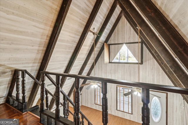 room details featuring wood ceiling, beamed ceiling, and wood finished floors