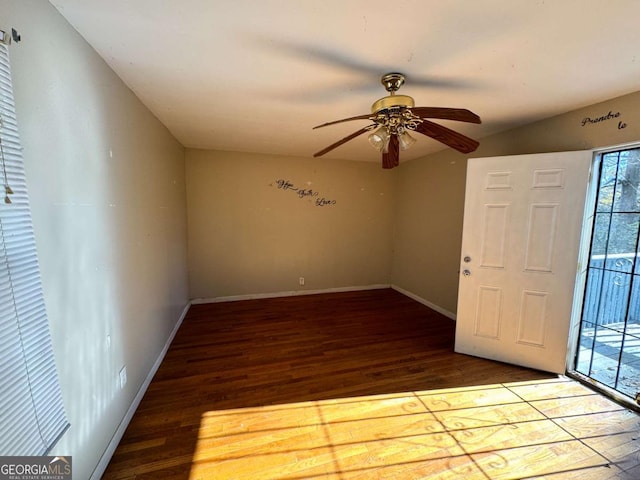 foyer entrance with hardwood / wood-style floors and ceiling fan