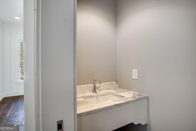 bathroom featuring hardwood / wood-style floors and vanity