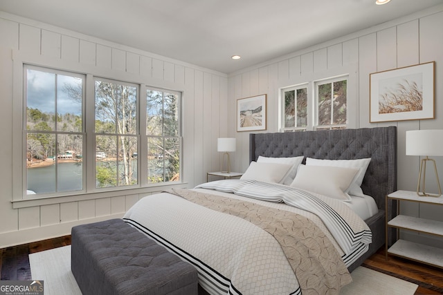 bedroom featuring dark hardwood / wood-style flooring