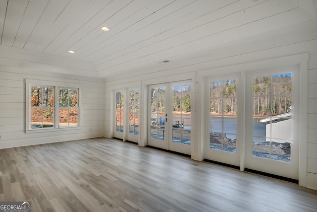 unfurnished sunroom with french doors and wood ceiling