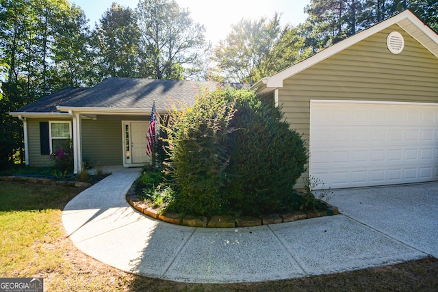 ranch-style home with a garage