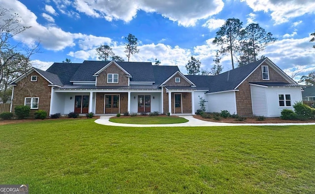 craftsman-style home with a porch and a front lawn