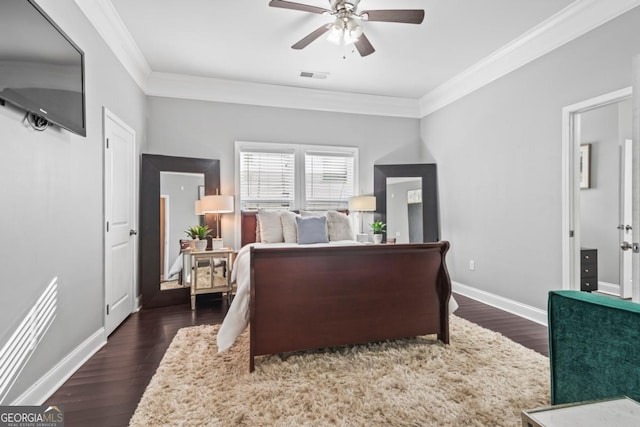 bedroom featuring ceiling fan, dark hardwood / wood-style flooring, and ornamental molding