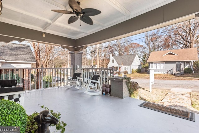 view of patio / terrace with ceiling fan and a porch