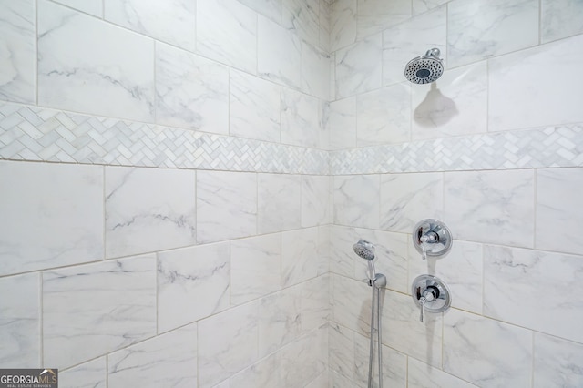 room details with a tile shower