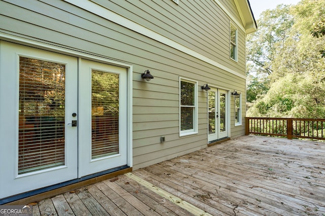 wooden deck featuring french doors