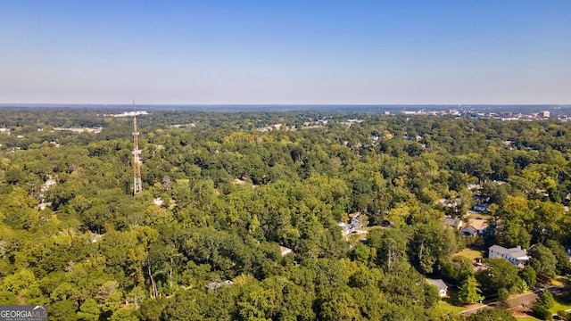 bird's eye view featuring a view of trees