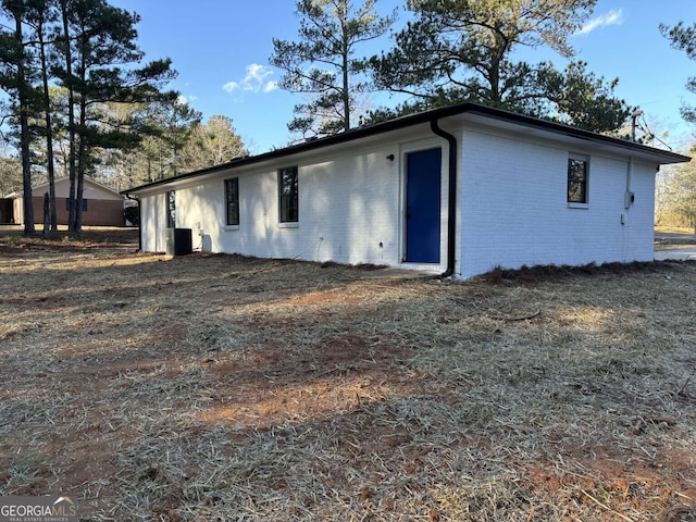 exterior space featuring central air condition unit