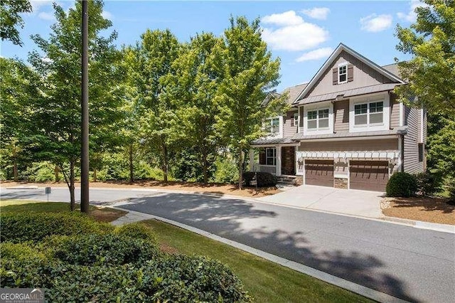 view of front of property with a garage