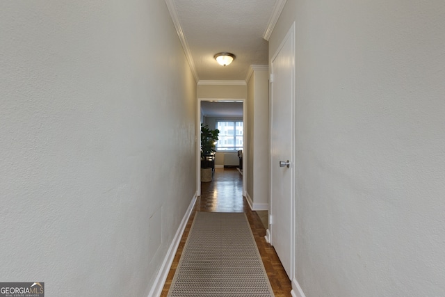 corridor featuring dark hardwood / wood-style floors and ornamental molding