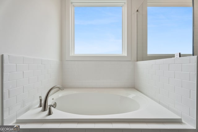 bathroom featuring a bath