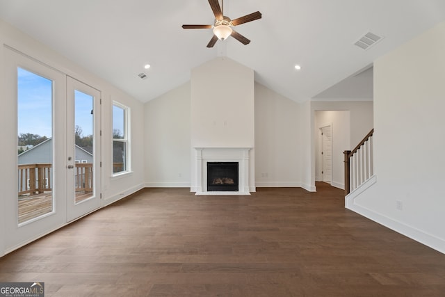 unfurnished living room featuring ceiling fan, lofted ceiling, dark wood-type flooring, and french doors