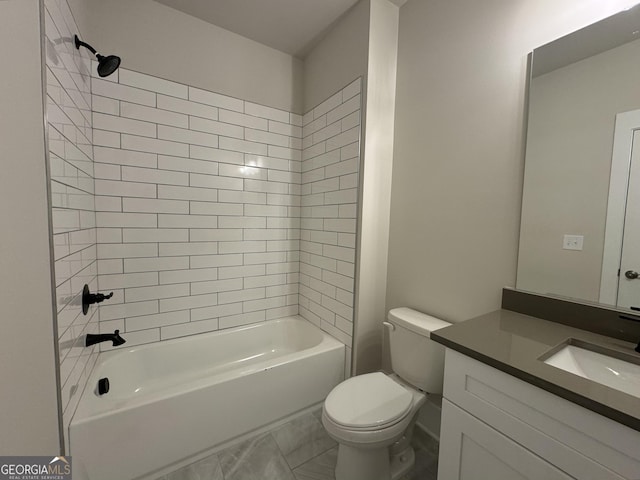 full bathroom with vanity, toilet, and tiled shower / bath