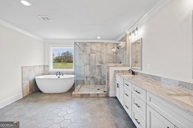 full bathroom featuring tiled shower / bath combo, toilet, and vanity