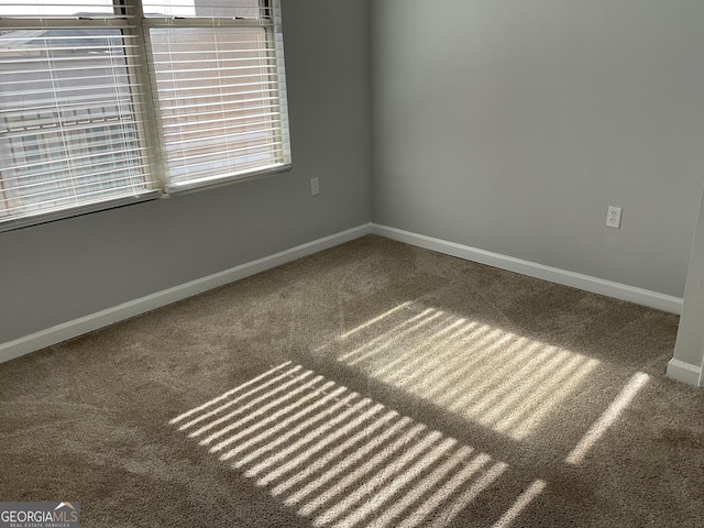 view of carpeted spare room