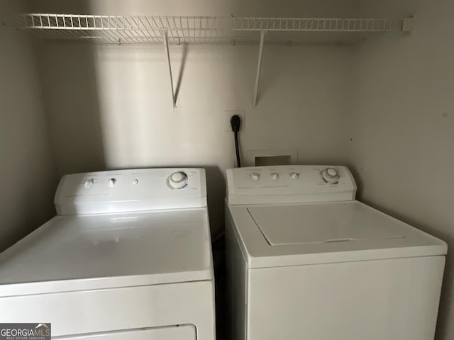 laundry room with washer and dryer