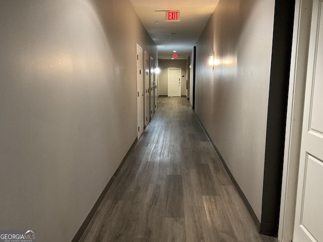 hall with dark hardwood / wood-style floors