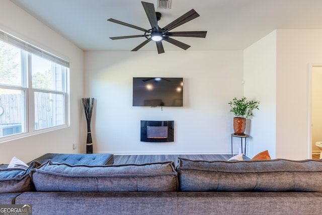 living room featuring ceiling fan