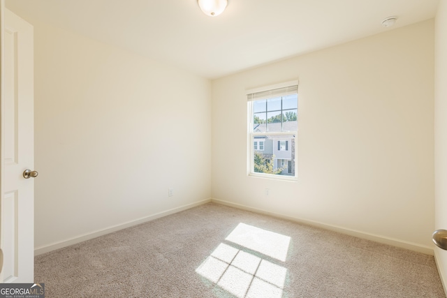 view of carpeted spare room