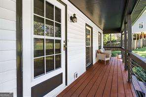 wooden deck featuring covered porch