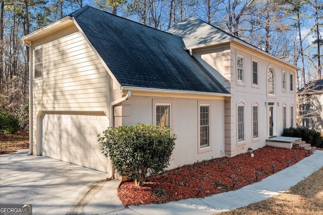 view of home's exterior with a garage