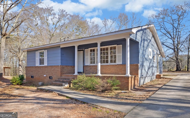 view of front of property featuring covered porch