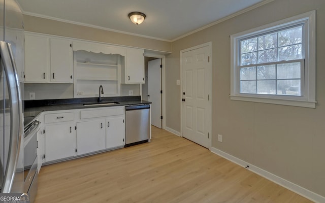 kitchen featuring white cabinetry, dishwasher, sink, light hardwood / wood-style flooring, and range