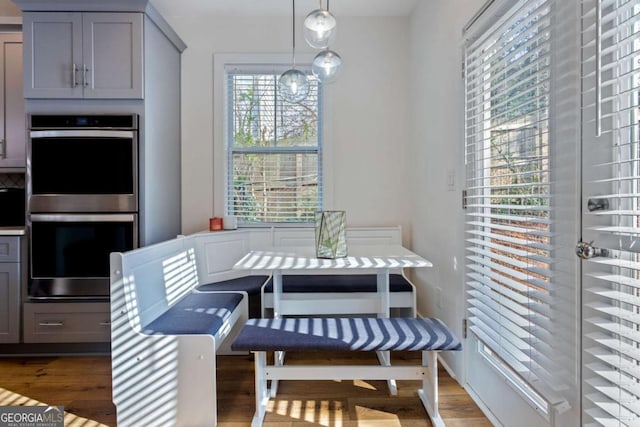 dining room with breakfast area and hardwood / wood-style flooring