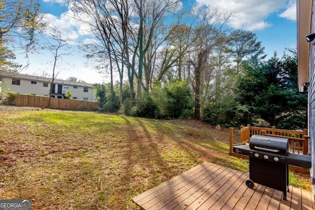 view of yard with a deck