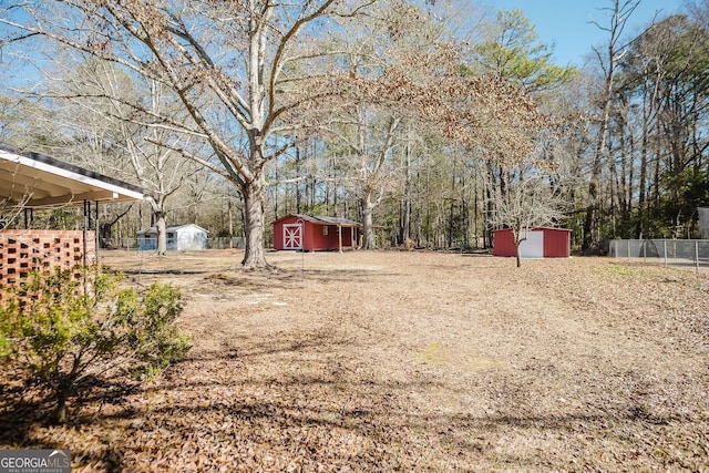 view of yard with a storage unit