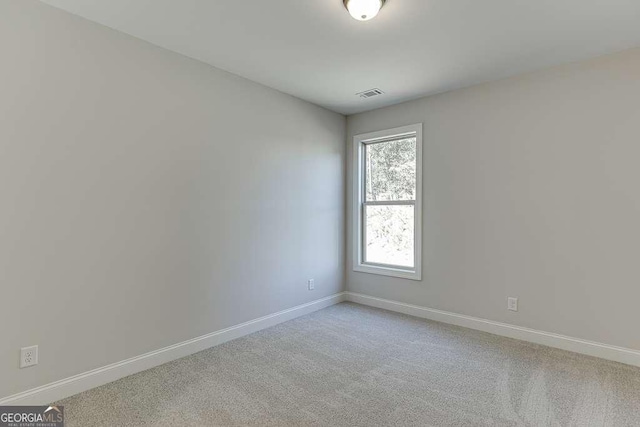 empty room featuring carpet floors