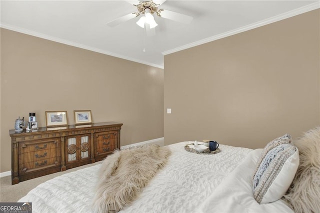 bedroom with carpet flooring, ceiling fan, and crown molding