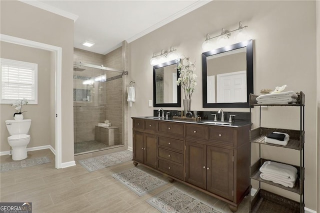 bathroom featuring tile patterned flooring, vanity, toilet, and walk in shower