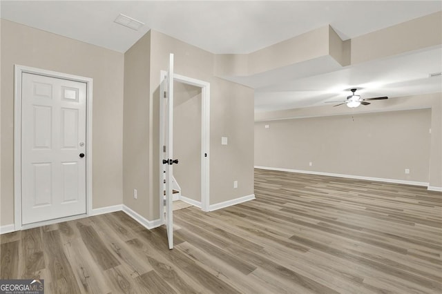 interior space featuring light hardwood / wood-style flooring and ceiling fan