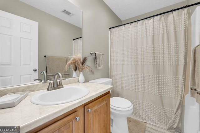 bathroom with a shower with shower curtain, vanity, and toilet