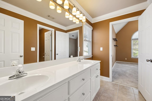 bathroom featuring vanity, tile patterned floors, and ornamental molding